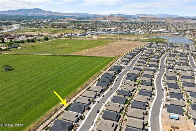 11235 Freedom Range Ln, Reno, NV 89521 - aerial perspective of suburban area featuring a water and mountain view