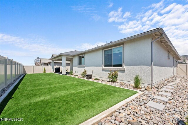 11235 Freedom Range Ln, Reno, NV 89521 - back of property with stucco siding