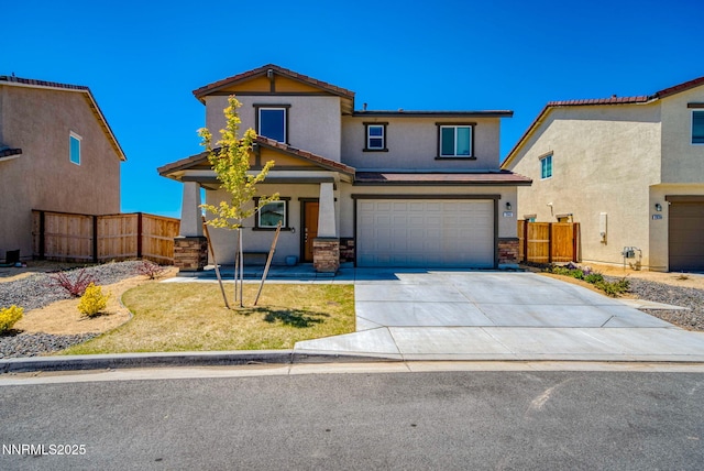 2040 Painted Sky Way, Sun Valley, NV 89433 - view of front facade with stucco siding, covered porch, an attached garage, concrete driveway, and stone siding
