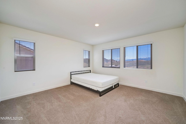 2040 Painted Sky Way, Sun Valley, NV 89433 - bedroom featuring carpet, baseboards, and recessed lighting