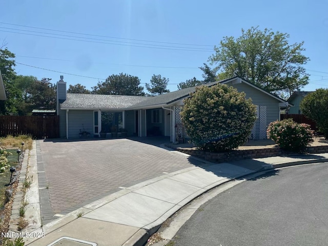 1196 La Via Way, Sparks, NV 89434 - view of front of property featuring decorative driveway and a chimney