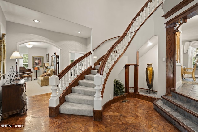 30 Francovich Ct, Reno, NV 89519 - foyer with recessed lighting, arched walkways, stairway, baseboards, and a high ceiling