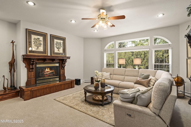 30 Francovich Ct, Reno, NV 89519 - living room featuring carpet, a ceiling fan, a glass covered fireplace, recessed lighting, and a baseboard radiator