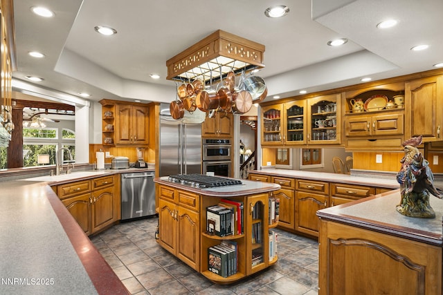 30 Francovich Ct, Reno, NV 89519 - kitchen with open shelves, stainless steel appliances, a sink, recessed lighting, and brown cabinetry