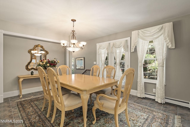 30 Francovich Ct, Reno, NV 89519 - dining area with a chandelier, baseboards, and a baseboard heating unit
