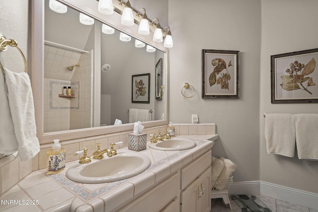30 Francovich Ct, Reno, NV 89519 - full bathroom with double vanity, tiled shower, tile patterned flooring, and baseboards