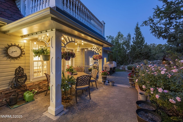 30 Francovich Ct, Reno, NV 89519 - patio at night with outdoor dining area and a patio area