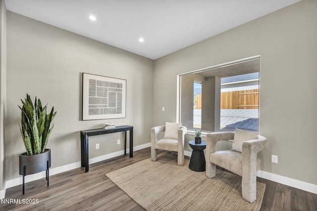 3952 Siena Dr, Carson City, NV 89703 - living area featuring baseboards, wood finished floors, and recessed lighting