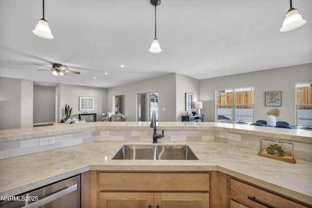 3952 Siena Dr, Carson City, NV 89703 - kitchen featuring a sink, open floor plan, dishwasher, decorative light fixtures, and recessed lighting