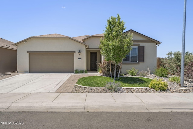 6810 Wheeler Peak Dr, Carson City, NV 89701 - ranch-style home with an attached garage, stucco siding, concrete driveway, and a front yard