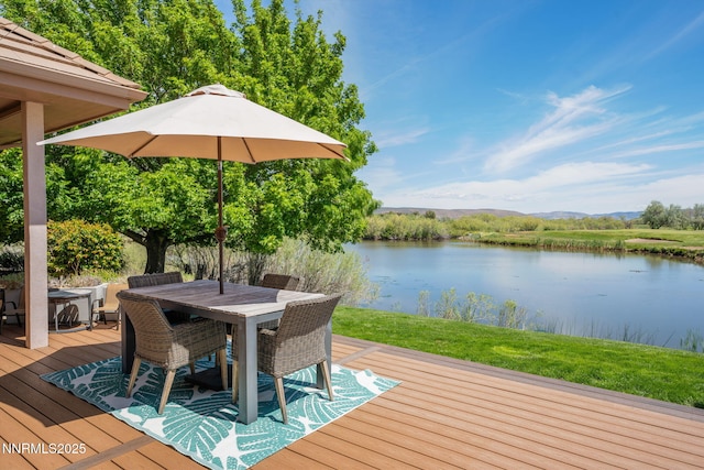 2473 Genoa Aspen Dr, Genoa, NV 89411 - deck with a water view, outdoor dining area, and a yard