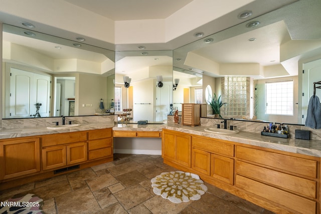 2473 Genoa Aspen Dr, Genoa, NV 89411 - full bath featuring vanity, stone tile flooring, recessed lighting, a shower, and tasteful backsplash