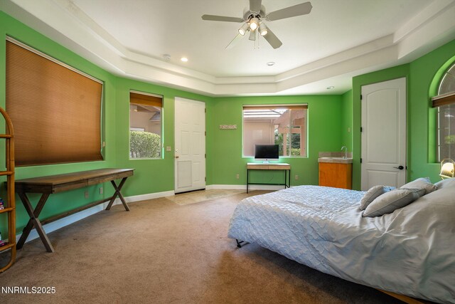 2473 Genoa Aspen Dr, Genoa, NV 89411 - carpeted bedroom with a raised ceiling, multiple windows, recessed lighting, baseboards, and a ceiling fan