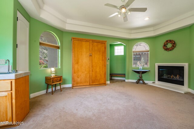 2473 Genoa Aspen Dr, Genoa, NV 89411 - entryway featuring a raised ceiling, a ceiling fan, light colored carpet, baseboards, and recessed lighting
