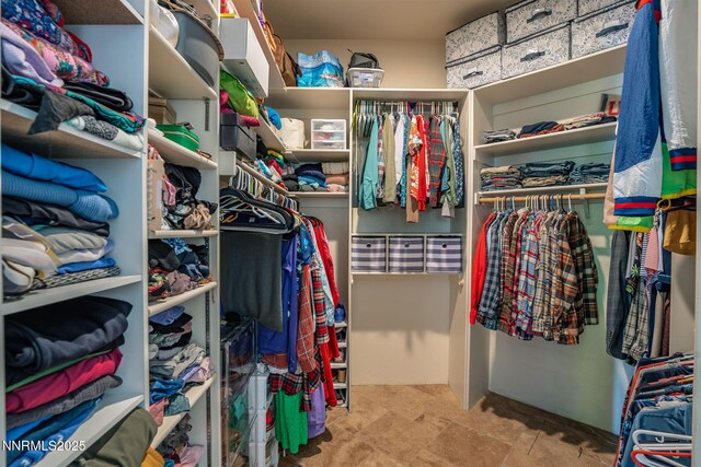 2473 Genoa Aspen Dr, Genoa, NV 89411 - spacious closet with stone finish floors