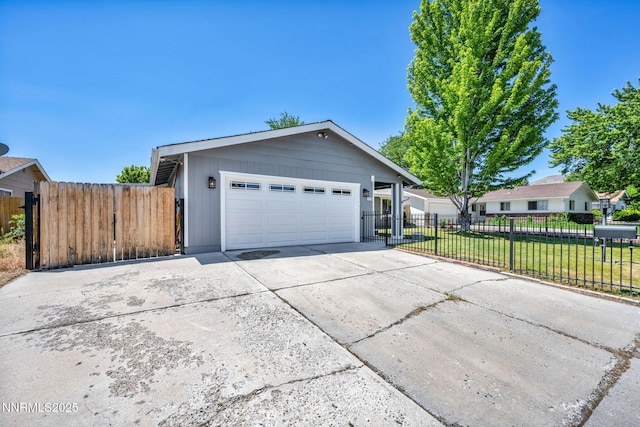 1129 Sonoma St, Carson City, NV 89701 - single story home featuring a garage, driveway, and a gate