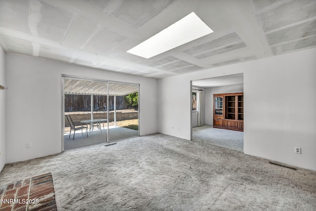1129 Sonoma St, Carson City, NV 89701 - carpeted empty room featuring a skylight