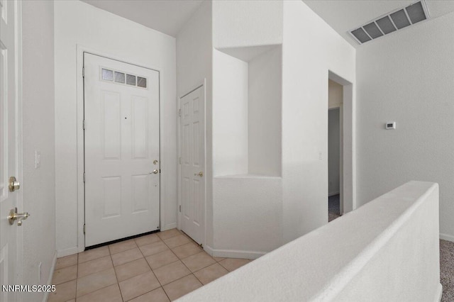 10548 Bliss Ct, Reno, NV 89521 - entryway featuring baseboards and light tile patterned flooring