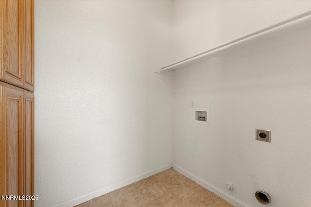 10548 Bliss Ct, Reno, NV 89521 - laundry room featuring hookup for a washing machine, cabinet space, baseboards, electric dryer hookup, and hookup for a gas dryer