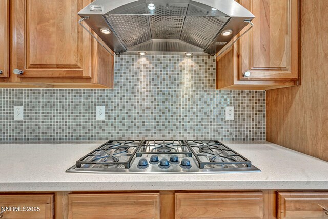 9900 Wilbur May Pkwy Apt 2801, Reno, NV 89521 - kitchen featuring island range hood, stainless steel gas cooktop, tasteful backsplash, and vaulted ceiling
