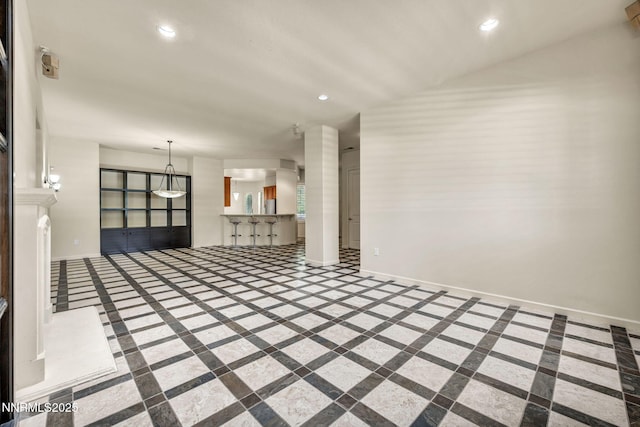 9900 Wilbur May Pkwy Apt 2801, Reno, NV 89521 - unfurnished living room featuring inlaid floor details, baseboards, recessed lighting, and a fireplace