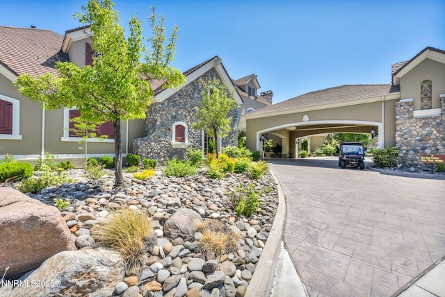 9900 Wilbur May Pkwy Apt 2801, Reno, NV 89521 - view of front of home featuring stucco siding and driveway