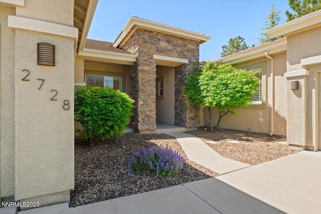 2728 Spirit Rock Trl, Reno, NV 89511 - view of exterior entry featuring stone siding and stucco siding