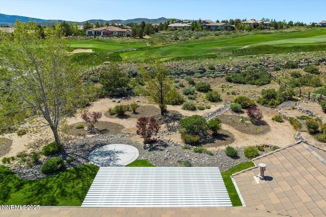 2728 Spirit Rock Trl, Reno, NV 89511 - aerial view of residential area featuring a golf club and a mountain backdrop