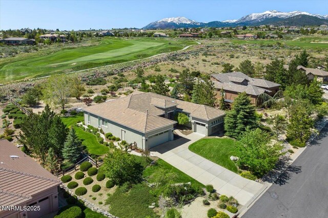 2728 Spirit Rock Trl, Reno, NV 89511 - aerial view of residential area with a golf club and a mountain backdrop