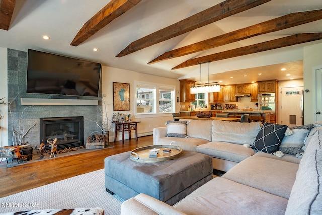 625 Freel Dr, Zephyr Cove, NV 89448 - living area featuring wood finished floors, a large fireplace, and recessed lighting