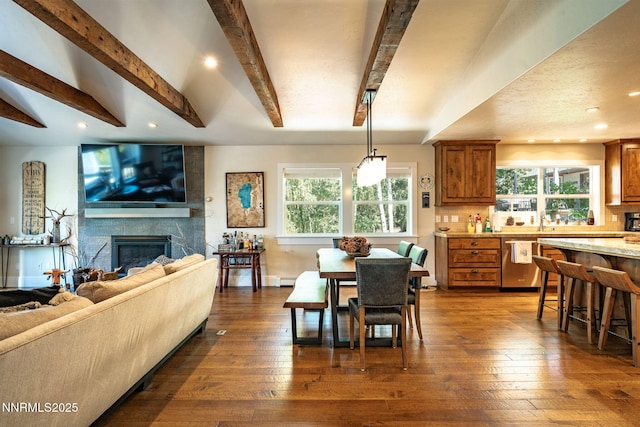 625 Freel Dr, Zephyr Cove, NV 89448 - dining space with beam ceiling, a large fireplace, dark wood-style floors, and recessed lighting