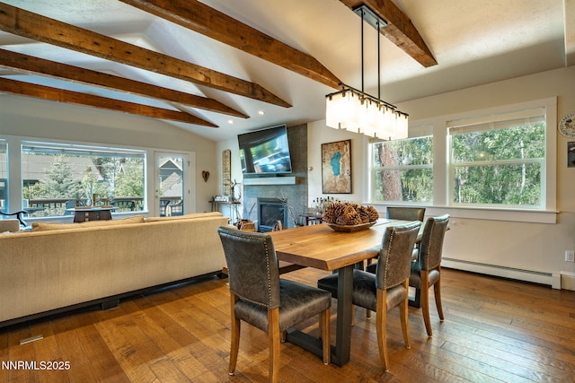 625 Freel Dr, Zephyr Cove, NV 89448 - dining space with a baseboard heating unit, a fireplace, hardwood / wood-style flooring, and recessed lighting
