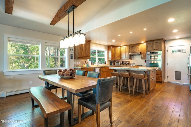 625 Freel Dr, Zephyr Cove, NV 89448 - dining room featuring dark wood-style floors, recessed lighting, and a baseboard radiator