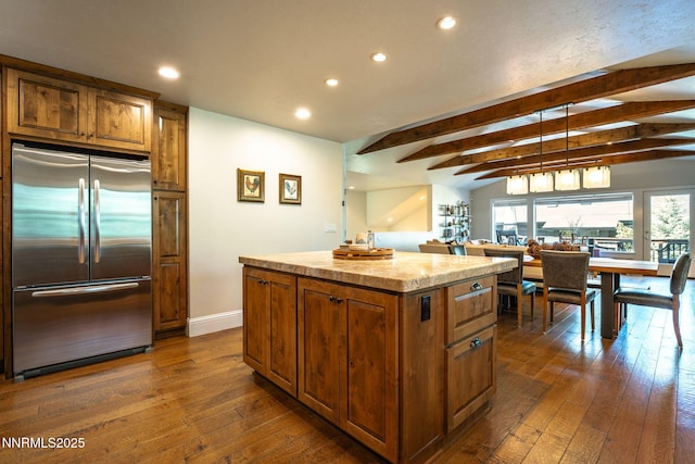 625 Freel Dr, Zephyr Cove, NV 89448 - kitchen with stainless steel fridge, recessed lighting, a kitchen island, brown cabinetry, and dark wood finished floors