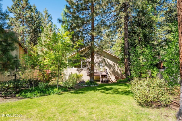 625 Freel Dr, Zephyr Cove, NV 89448 - view of green lawn featuring stairs and a deck