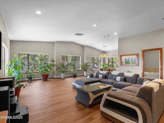 315 Paiute Dr, Zephyr Cove, NV 89448 - living area featuring light wood-type flooring, lofted ceiling, and recessed lighting