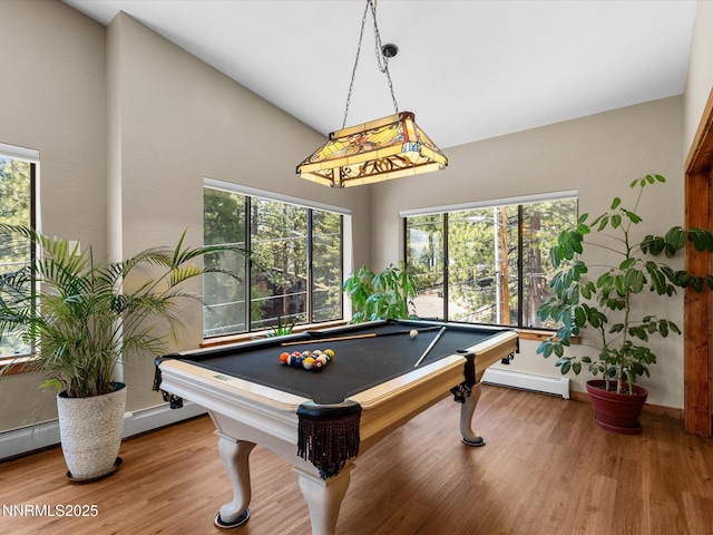 315 Paiute Dr, Zephyr Cove, NV 89448 - recreation room featuring billiards, baseboard heating, plenty of natural light, wood finished floors, and lofted ceiling
