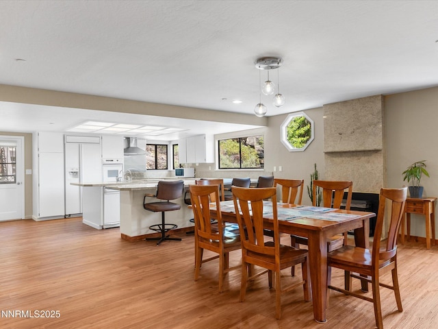 315 Paiute Dr, Zephyr Cove, NV 89448 - dining room featuring light wood-type flooring and baseboards