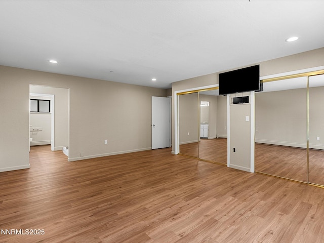 315 Paiute Dr, Zephyr Cove, NV 89448 - unfurnished bedroom featuring two closets, light wood finished floors, recessed lighting, and ensuite bathroom