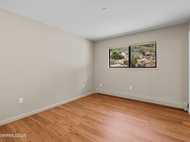 315 Paiute Dr, Zephyr Cove, NV 89448 - empty room with light wood-type flooring and baseboard heating