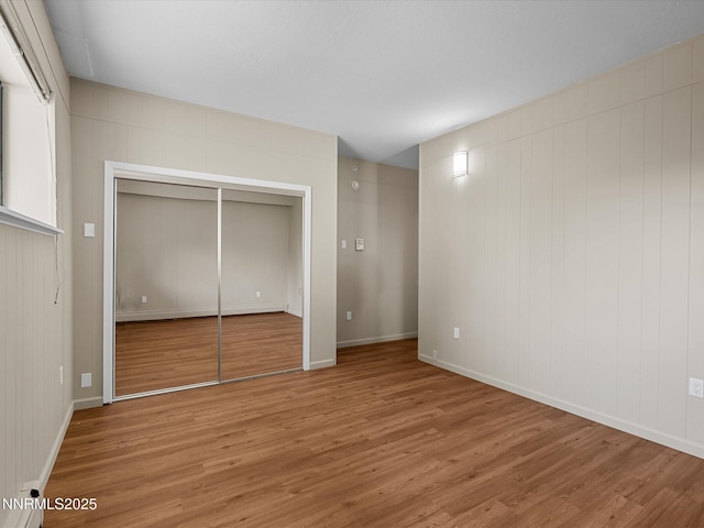 315 Paiute Dr, Zephyr Cove, NV 89448 - unfurnished bedroom featuring light wood-type flooring and a closet