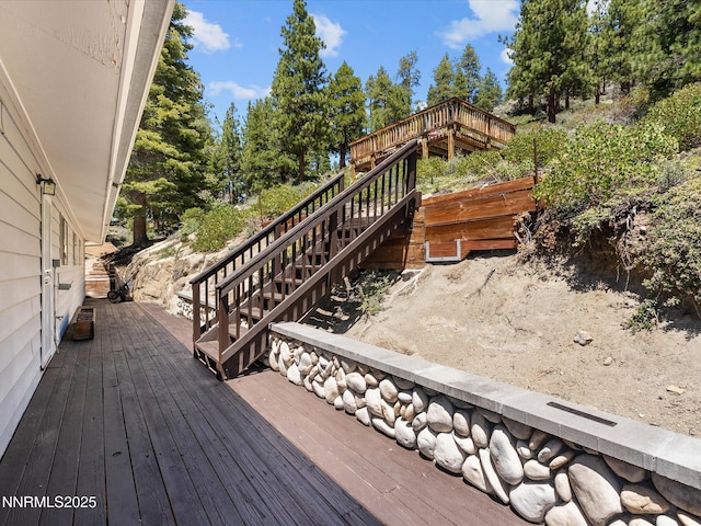 315 Paiute Dr, Zephyr Cove, NV 89448 - wooden terrace with stairway and view of scattered trees