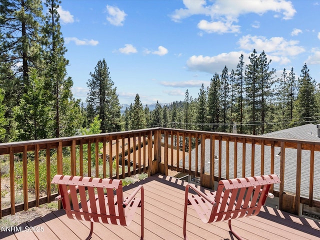 315 Paiute Dr, Zephyr Cove, NV 89448 - wooden deck featuring a wooded view