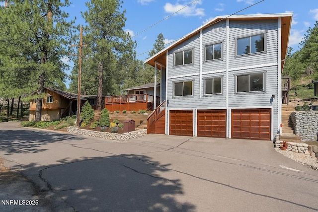315 Paiute Dr, Zephyr Cove, NV 89448 - view of front of property with concrete driveway and an attached garage