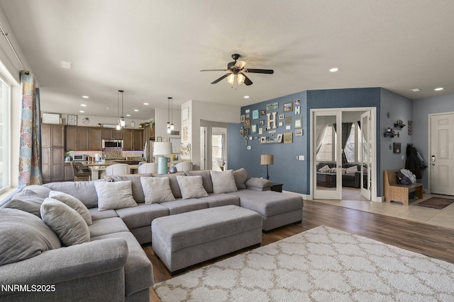 11760 Valley Crest Dr, Sparks, NV 89441 - living area with a ceiling fan, wood finished floors, healthy amount of natural light, and recessed lighting