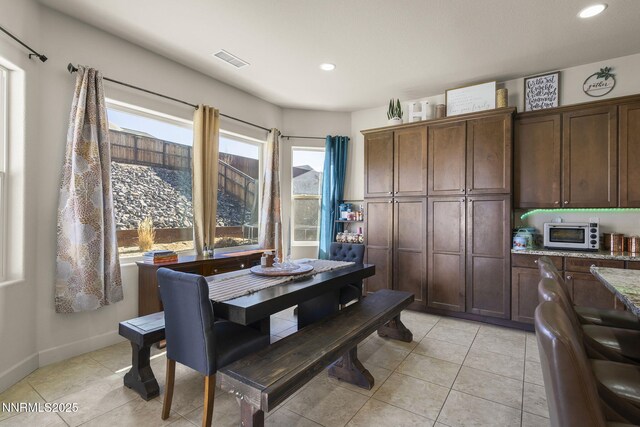 11760 Valley Crest Dr, Sparks, NV 89441 - dining space with recessed lighting, light tile patterned flooring, and baseboards