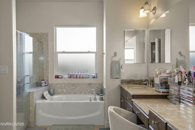 11760 Valley Crest Dr, Sparks, NV 89441 - full bathroom featuring vanity, a garden tub, and a shower stall