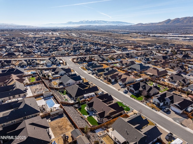 11760 Valley Crest Dr, Sparks, NV 89441 - aerial view of property's location featuring a mountainous background and nearby suburban area