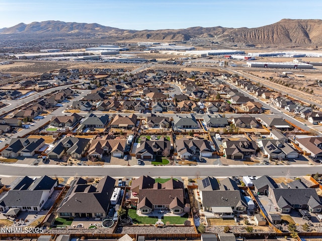 11760 Valley Crest Dr, Sparks, NV 89441 - aerial view of property's location featuring a mountain backdrop and nearby suburban area