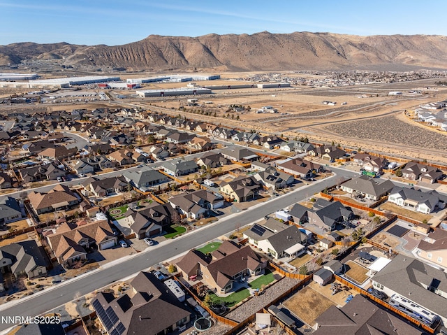 11760 Valley Crest Dr, Sparks, NV 89441 - aerial overview of property's location featuring a mountain backdrop and nearby suburban area
